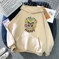 Oversized beige hoodie for women with butterfly and daisy print in a cozy flat lay style - S / Apricot