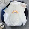 White fleece-lined hoodie with rainbow print and kangaroo pocket in a casual flat lay - S / White