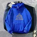 Detail of royal blue hoodie showing golden eye of Horus graphics and kangaroo pocket texture - S / Royal Blue