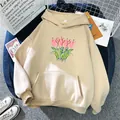 Flat lay of an oversized beige hoodie with pink tulip print and kangaroo pocket detail - Apricot