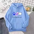 Detailed close-up of light blue hoodie featuring dog paw and heart graphic prints - S / Sky Blue