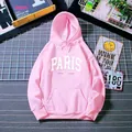 Détail du sweat à capuche rose avec imprimé Paris France blanc et poche kangourou - Rose vif
