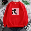 Detailed close-up of a red crewneck sweatshirt featuring a black cat illustration print - S / Red