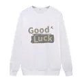 Witte dames sweater met ronde hals en 'Good Luck' print met geribde manchetten en zoom - S / Wit