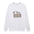 Lockeres weißes Damen-Sweatshirt mit Rundhalsausschnitt und A' You OK-Grafik - S / Weiß