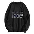 Close-up of Class of 1987 printed lettering on a black cotton crewneck sweatshirt - S / Black