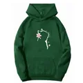 Detailed close-up of dark green hoodie featuring a white cat and pink cherry blossom print - S / Dark Green
