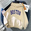 Detail of apricot Boston hoodie with ribbed cuffs and large kangaroo pocket design - Apricot