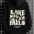 Women's black fleece hoodie with LOVE NEVER FAILS back print and ribbed cuffs - S / Black