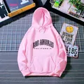 Pink Los Angeles hoodie featuring a drawstring hood and kangaroo pocket on a grid background - Hot Pink