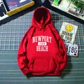 Felpa con cappuccio rossa oversize con stampa Newport 1984 Beach e tasca a marsupio - M / Rosso