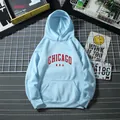 Sweat à capuche bleu clair avec imprimé Chicago USA rouge et poche kangourou style urbain - M / Bleu ciel