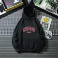 Sweat à capuche noir pour femme avec imprimé Chicago et coupe oversize décontractée - M / Noir