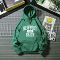 Felpa con cappuccio oversize verde scuro con stampa Newport 1984 Beach e tasca a marsupio - M / Verde Scuro