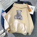 Oversized apricot hoodie featuring a geometric bear print and front kangaroo pocket - S / Apricot