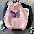 Detailed flat lay of a pink butterfly floral hoodie paired with denim and casual sneakers - S / Dark Pink