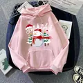 Close-up of pink Christmas hoodie featuring a cute snowman and Believe festive print - S / Dark Pink