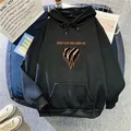 Women's black oversized hoodie with orange Keep Calm lettering and heart motif - S / Black