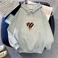 Flat lay of light grey oversized hoodie featuring heart graphic and kangaroo pocket detail - S / Light Gray