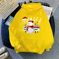 Detail of yellow Christmas hoodie with snowman print and Believe lettering decoration - S / Yellow