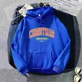 Detailed view of blue Christmas fleece hoodie with festive graphic and ribbed texture - S / Blue