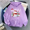 Loose purple hoodie with festive snowman print and Believe text in a flat lay style - S / Light Purple
