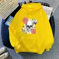 Detail of yellow skull flower hoodie featuring drawstring hood and kangaroo pocket - S / Yellow