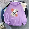 Detail of lavender fleece hoodie featuring gothic skull and pink floral art print - S / Light Purple