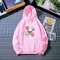 Pink oversized hoodie with floral skull print and kangaroo pocket in a streetwear setting - S / Hot Pink