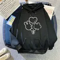 Oversized black hoodie for women featuring balloon prints and drawstring hood design - S / Black