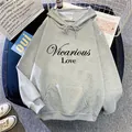 Detail showing printed Vicarious Love lettering and kangaroo pocket on gray hoodie - S / Light Gray