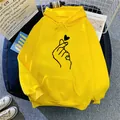 Oversized bright yellow drawstring hoodie with hand heart graphic and front pocket - Yellow