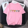 Flat lay of pink cotton T-shirt with heart prints and One Day At A Time slogan - S / Pink
