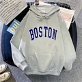 Grey oversized hoodie with blue Boston print and front kangaroo pocket on flat lay background - S / Gray