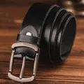 Men's black genuine leather belt featuring a matte silver buckle on a wooden surface - 105cm / Black
