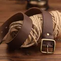 Classic men's brown genuine leather belt with a vintage brass buckle on wood table - 105cm / Coffee