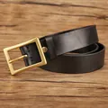 Classic black leather belt with a vintage brass pin buckle on a wooden background - 105cm / Black