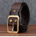 Detail of vintage brown leather belt with solid brass pin buckle and metal rivets - 105cm / Coffee