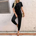 Damen Sommer Kurzarm Jumpsuit in Schwarz mit Kordelzug an der Taille und Bündchen - S / Schwarz