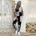 Damen-Zweiteiler mit grau-schwarzem Colorblock-Kurzarm-Oberteil und passender Freizeithose - S / Schwarz