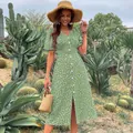 Abito a fiori verde stile francese con scollo a V, maniche a sbuffo e bottoni bianchi - L / Verde