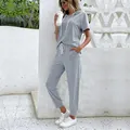 Women's grey two-piece casual tracksuit with short sleeve hoodie and drawstring joggers - S / Gray