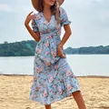 Abito estivo azzurro a fiori con scollo a V e bordo a balze per le vacanze - S / Blu