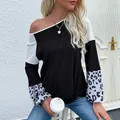 Top in maglia a nido d'ape leopardato con spalla scoperta e nodo decorativo - S / Nero