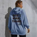 Relaxed fit light blue hoodie for women with black slogan print and a smiley face back - XS / Light Blue