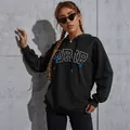 Felpa nera oversize con scritta DRIP e stampe di farfalle blu per uno stile urban chic - XS / Nero