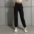 Schwarze Jogginghose mit hohem Bund, elastischem Kordelzug und Bündchen für Damen - S / Schwarz