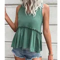 Women's dark green V-neck sleeveless peplum top paired with casual denim shorts - S / Green