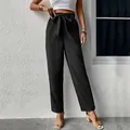 Pantaloni neri a vita alta stile paperbag da donna con cintura e tasche per l'estate - S / Nero