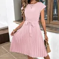 Short sleeve pleated dress in light pink featuring an adjustable waist tie and round neck - Pink